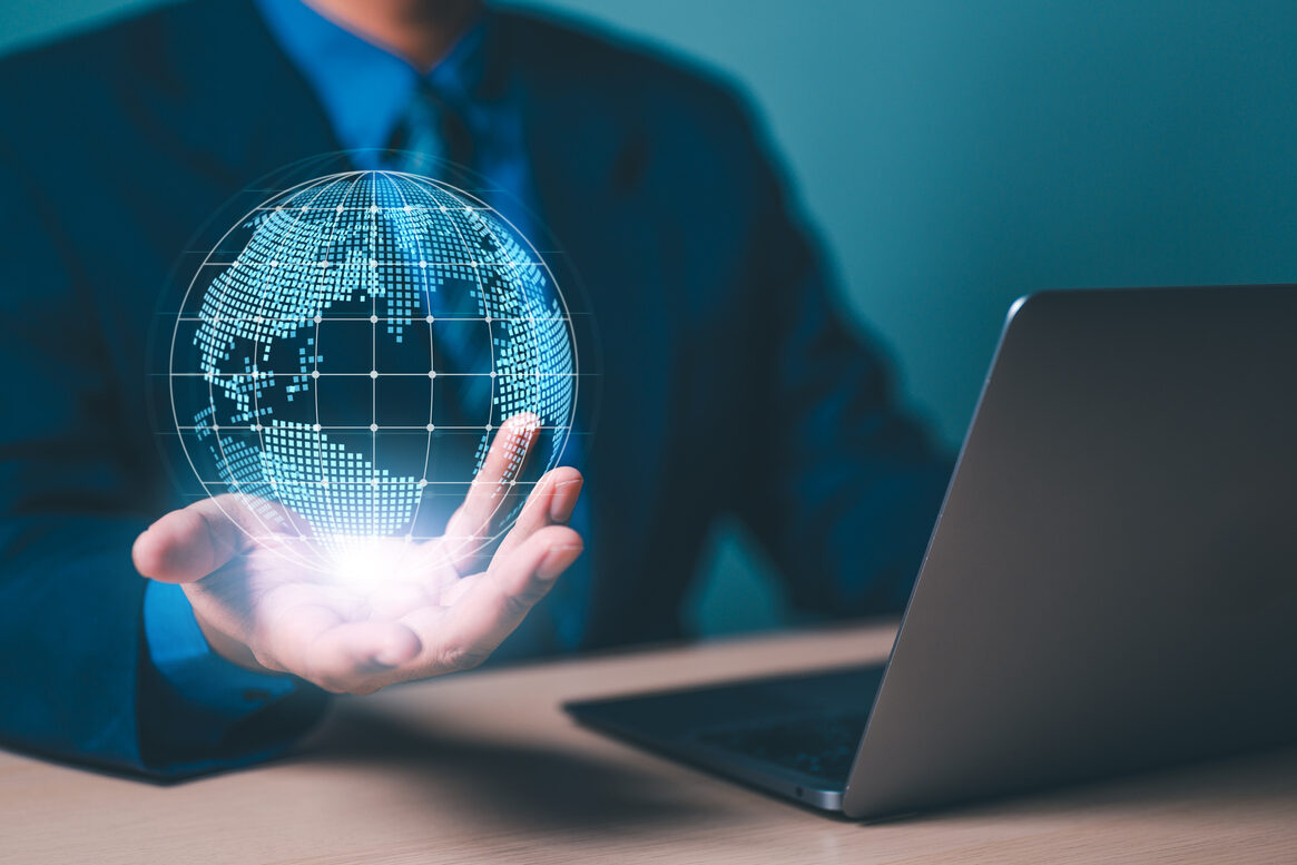 businessman holds holographic globe, futuristic technology concept created with technology. betrokkenheid van burgers